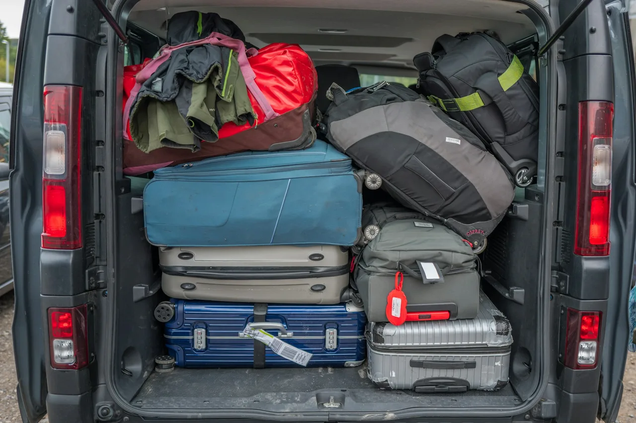 Private transfer van packed with luggage for a trip