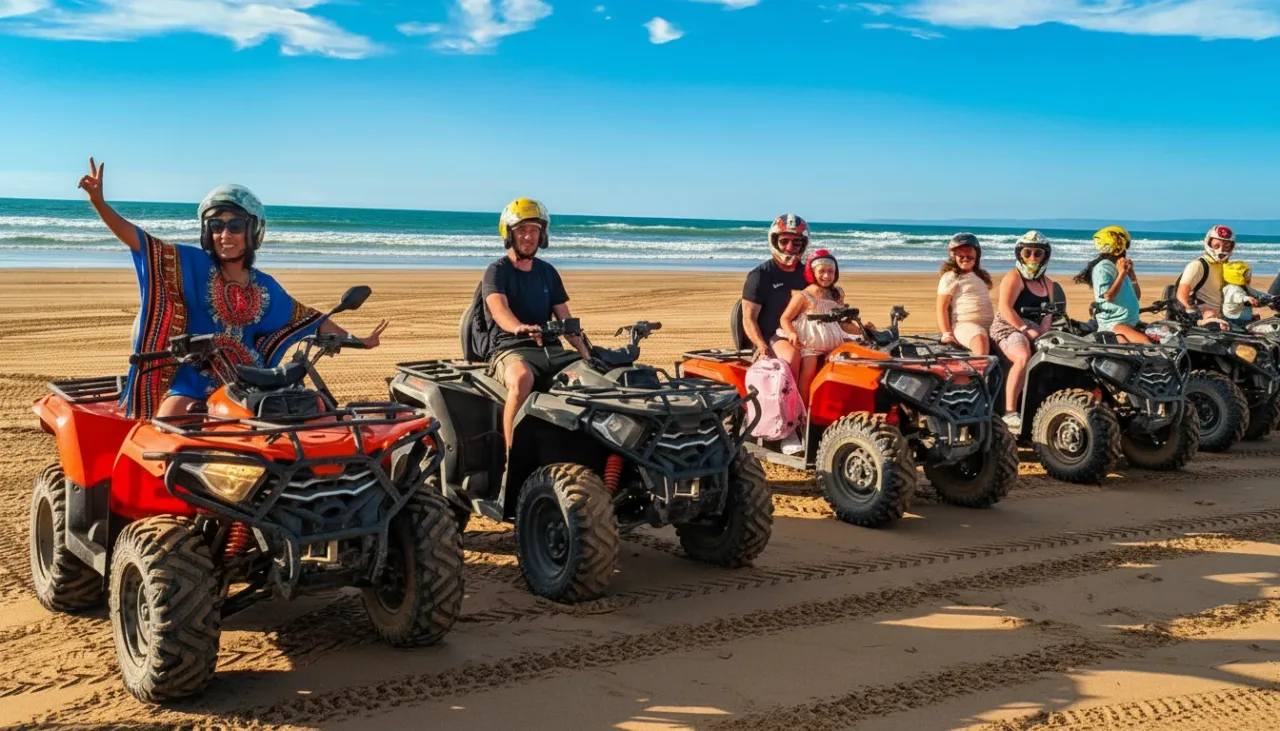 Happy friends posing with quads in the Moroccan desert at sunset